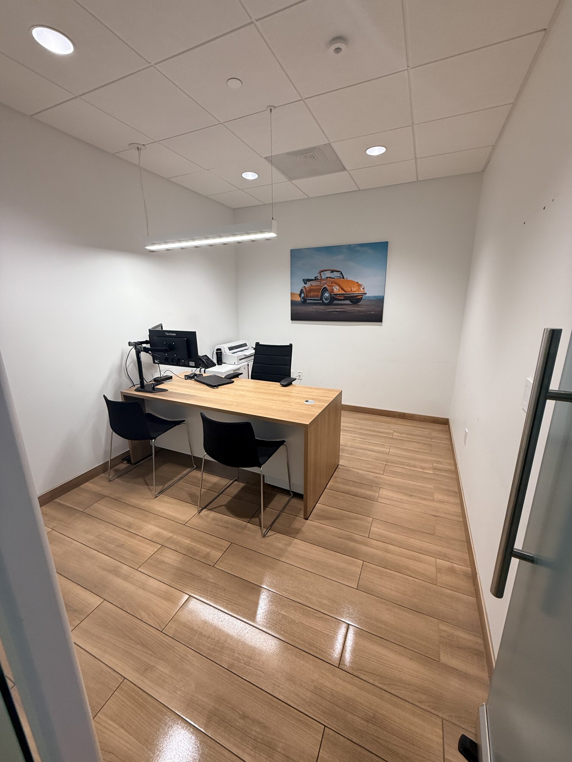 Sanitizing executive desk stations in a modern commercial office