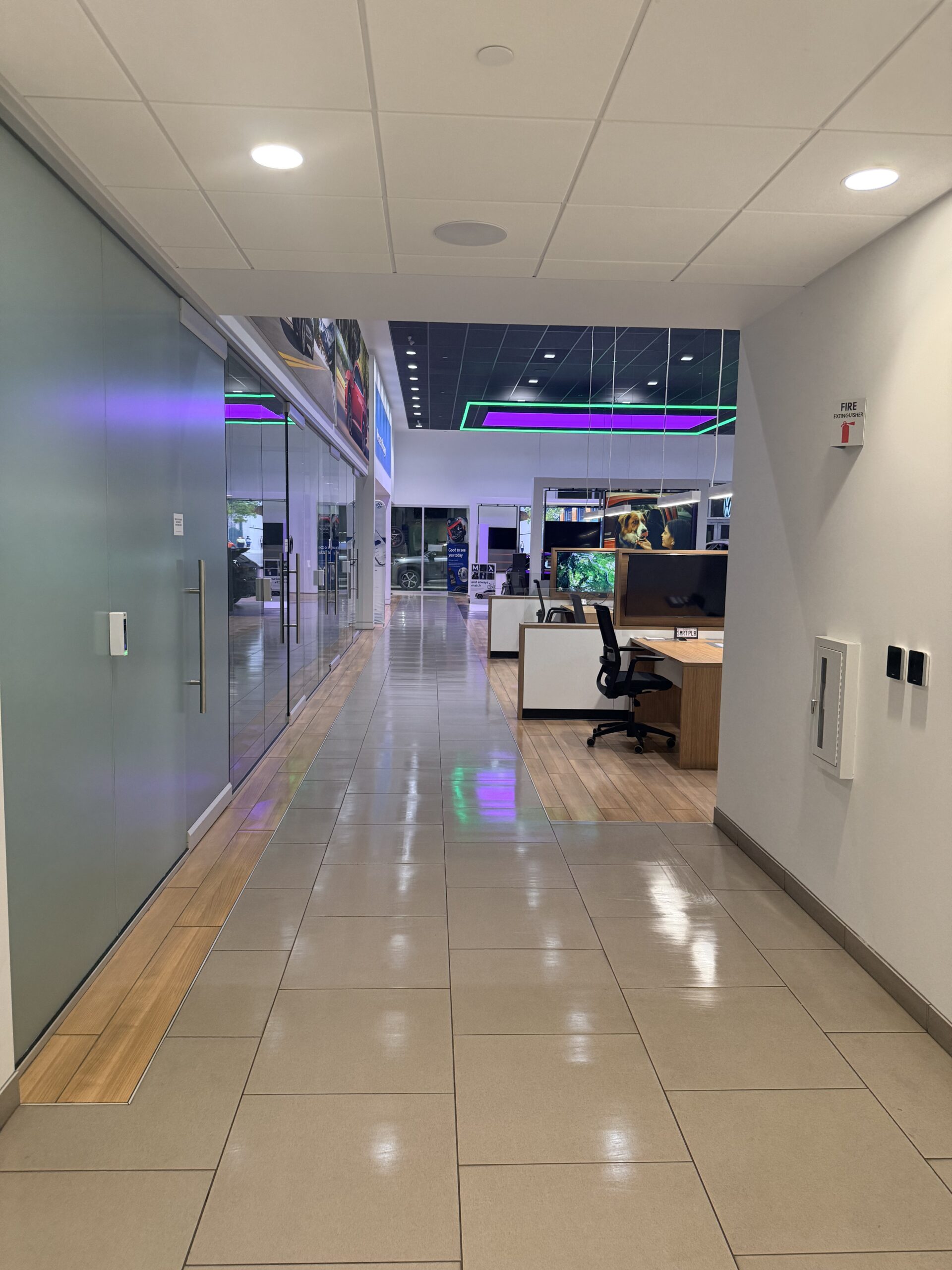 Fresh & Wet Janitorial service execution - rotary buffer operating on commercial hallway flooring